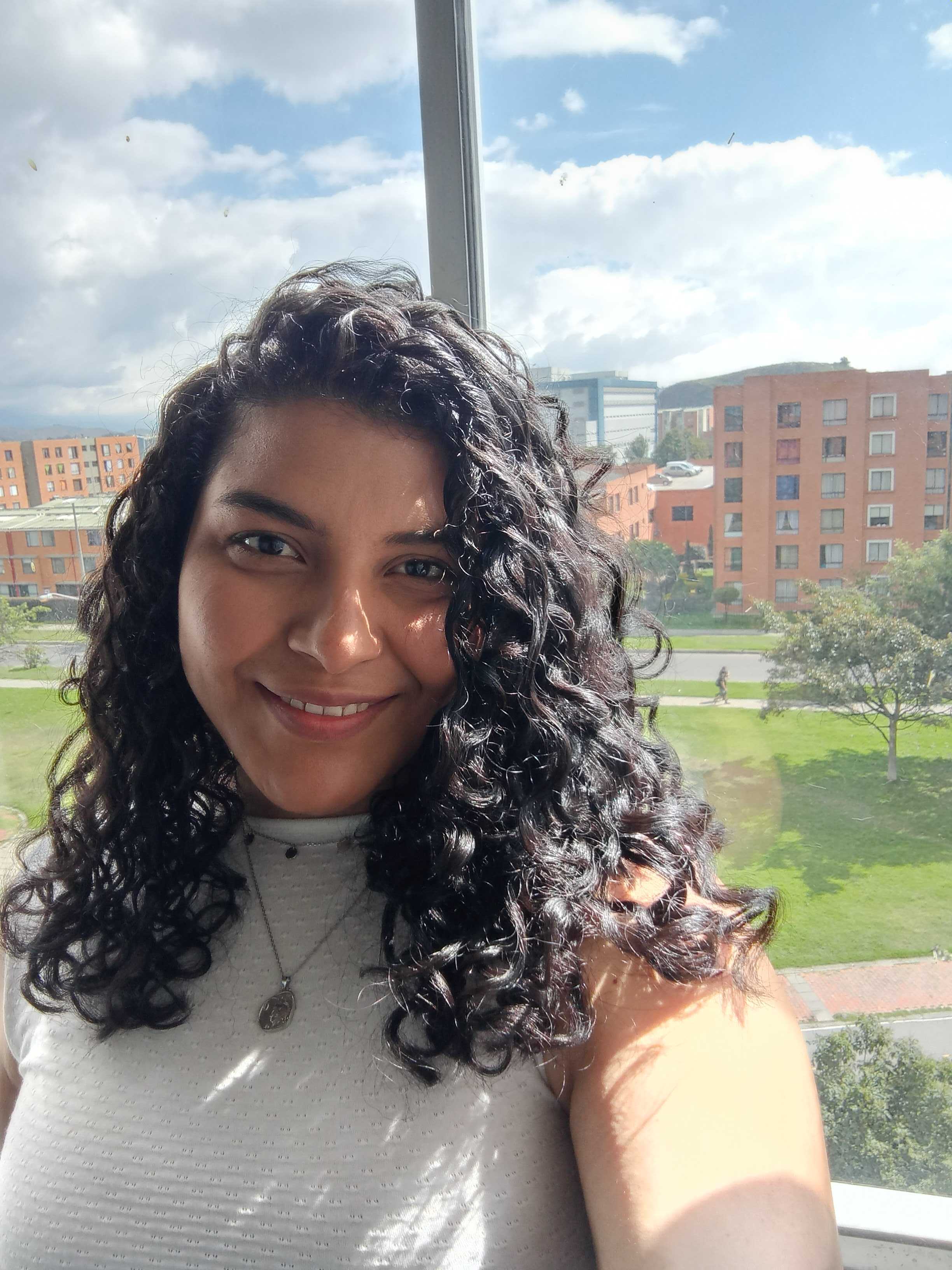 Carylis Palacios Window View Selfie In Marketing Office
